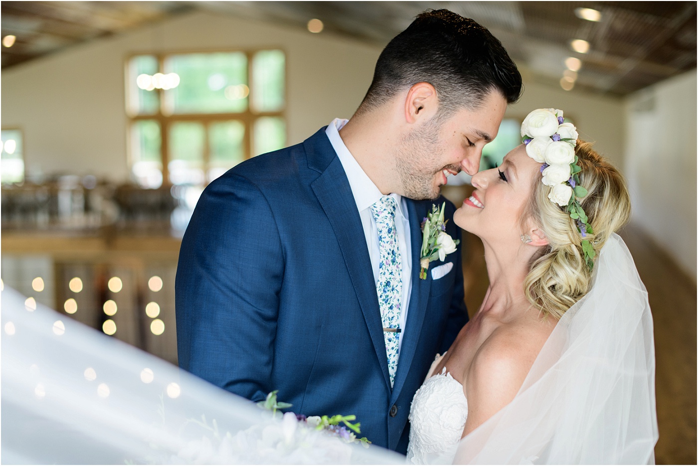 Carper Winery Wedding | Groom with navy tuxedo and Bride with flower crown and strapless wedding dress