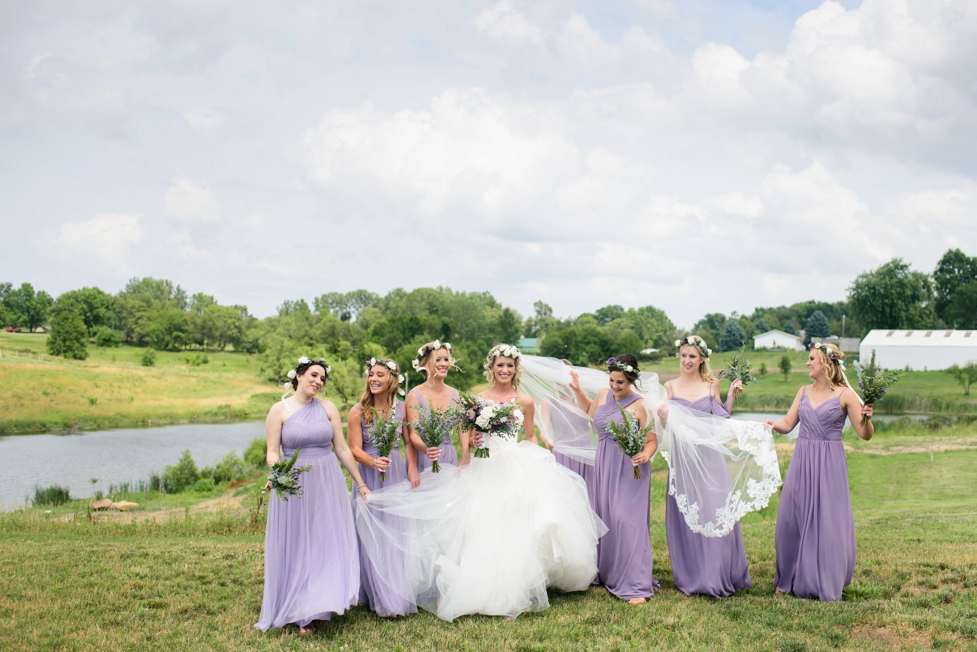 IA wedding photographer | photo of bridesmaids in light purple dresses | carper vineyard and winery
